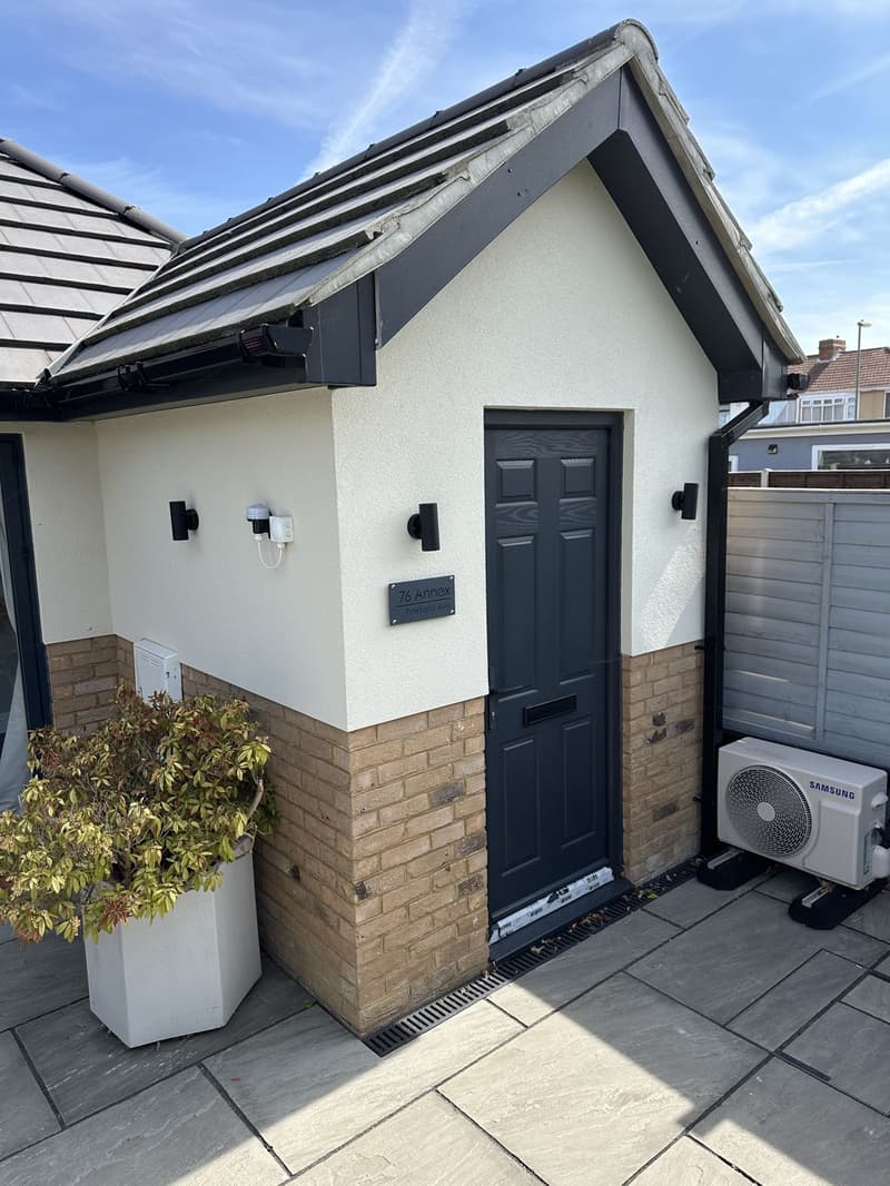 Rear garage converted to a 1 bedroom annex with garage in Fareham by Signature Design Architecture